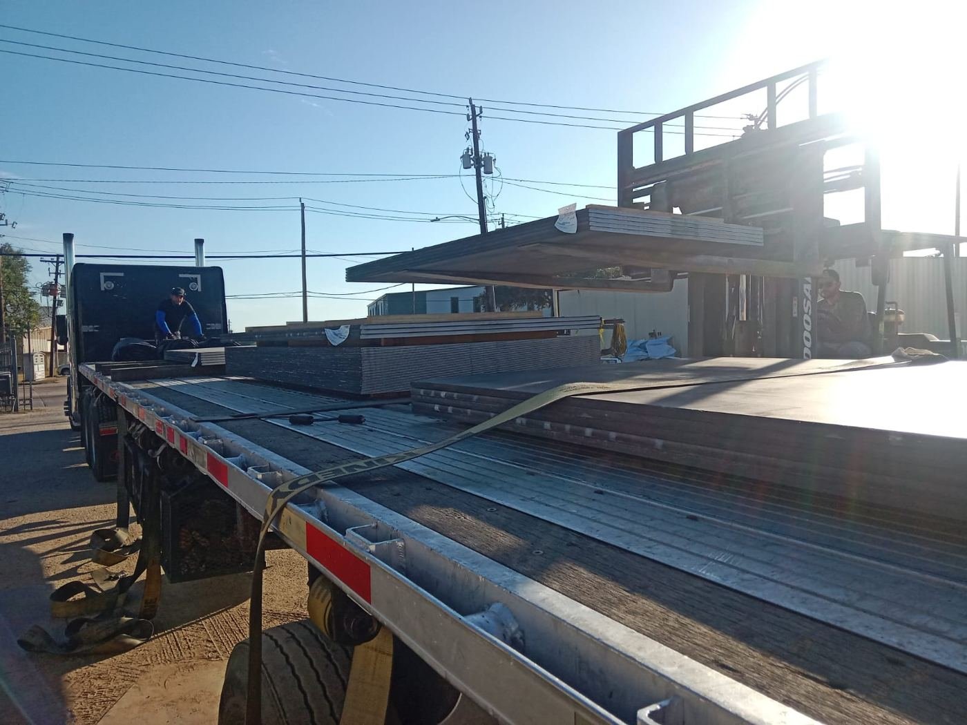 Steel tubing loaded on a flatbed for delivery